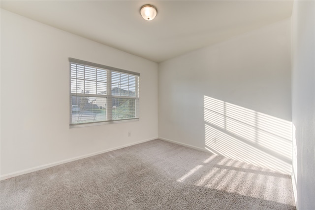 empty room with carpet flooring