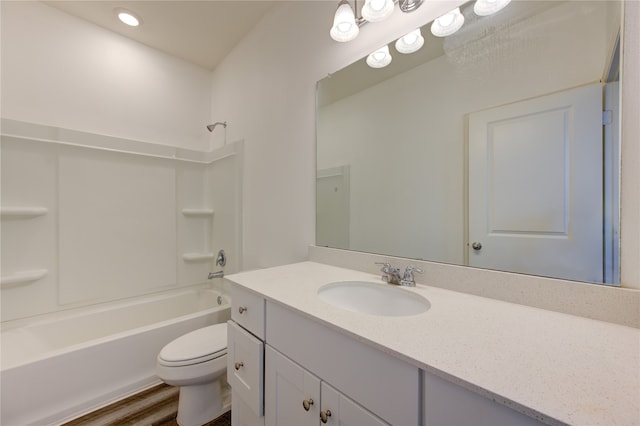 full bathroom featuring shower / tub combination, vanity, toilet, and wood-type flooring