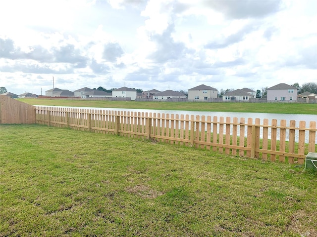 view of yard featuring a water view