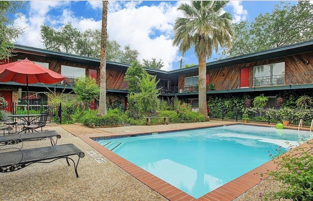 view of swimming pool featuring a patio