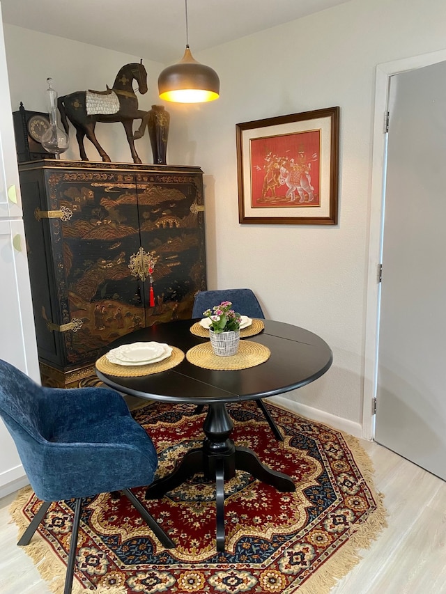 dining area featuring light hardwood / wood-style floors