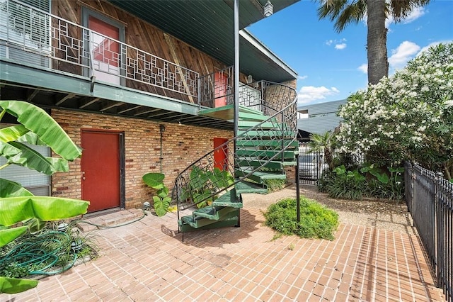 view of patio / terrace with a balcony