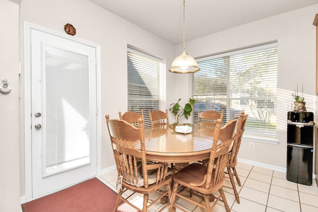 dining room with light tile patterned flooring