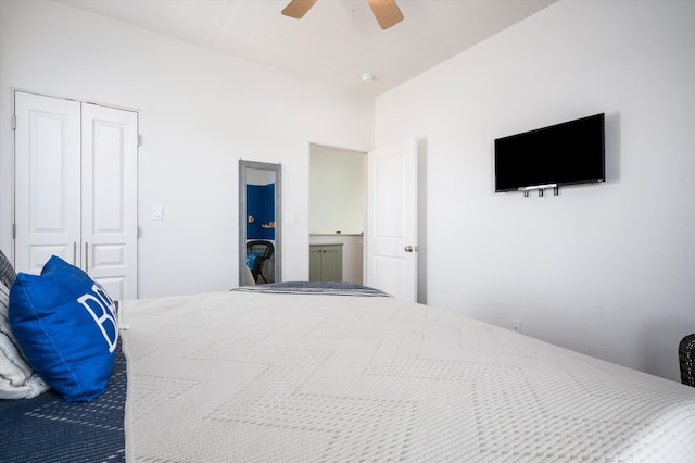 bedroom featuring ceiling fan and a closet