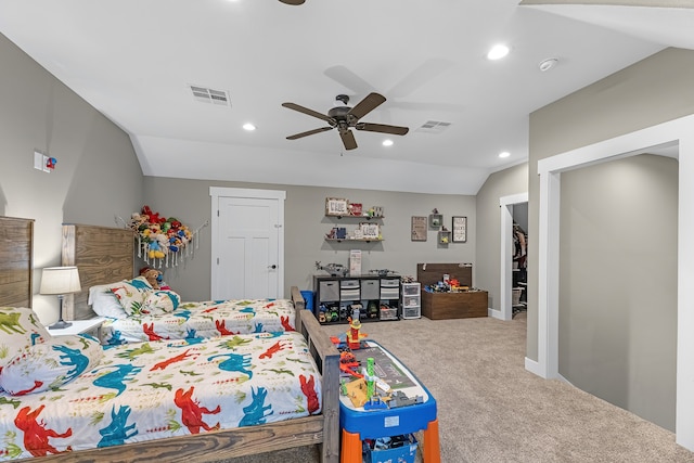 bedroom featuring carpet flooring, ceiling fan, lofted ceiling, and a closet