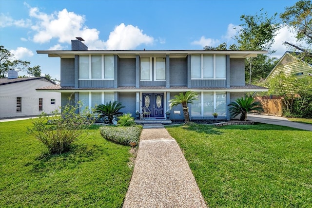 view of front of property with a front lawn