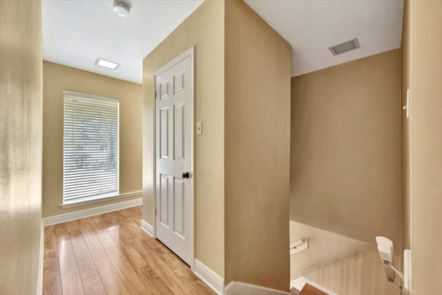 hallway featuring light hardwood / wood-style floors