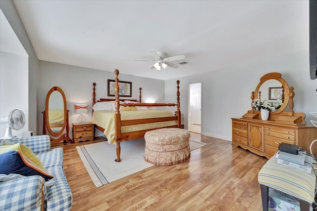 bedroom featuring ceiling fan and light hardwood / wood-style floors