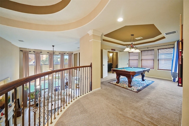 rec room with a raised ceiling, light carpet, and pool table