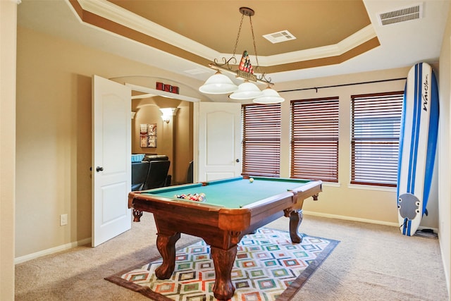 recreation room featuring a tray ceiling, light colored carpet, ornamental molding, and pool table