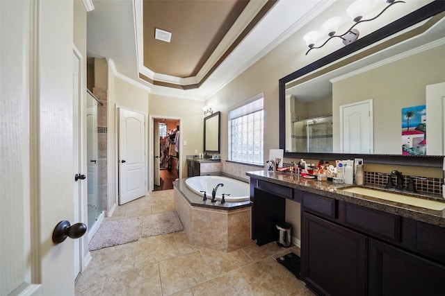 bathroom featuring vanity, crown molding, and independent shower and bath