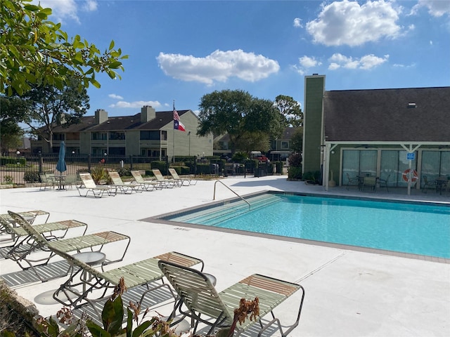 view of pool featuring a patio