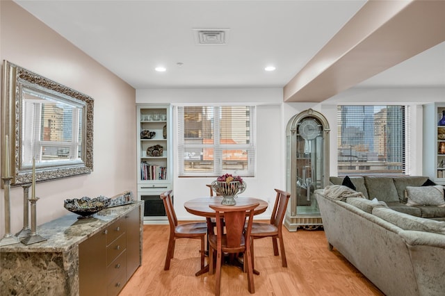 dining area with light wood-type flooring