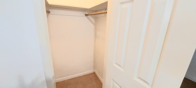 walk in closet featuring tile patterned floors