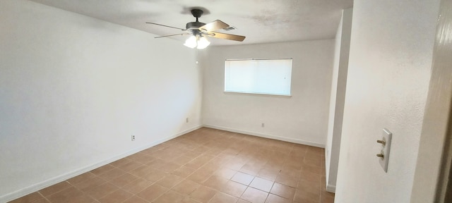 spare room featuring ceiling fan