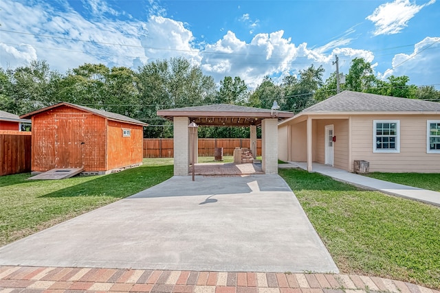 exterior space with a gazebo, a storage unit, a patio, and a front yard