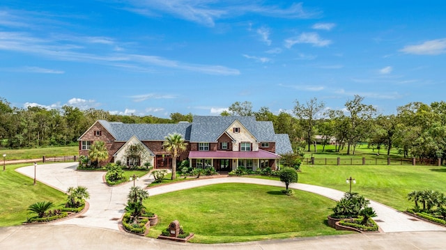 view of front of property with a front lawn