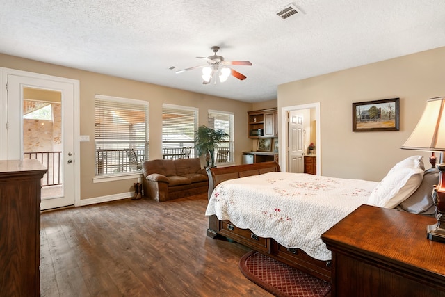 bedroom with ceiling fan, dark hardwood / wood-style floors, access to exterior, and multiple windows