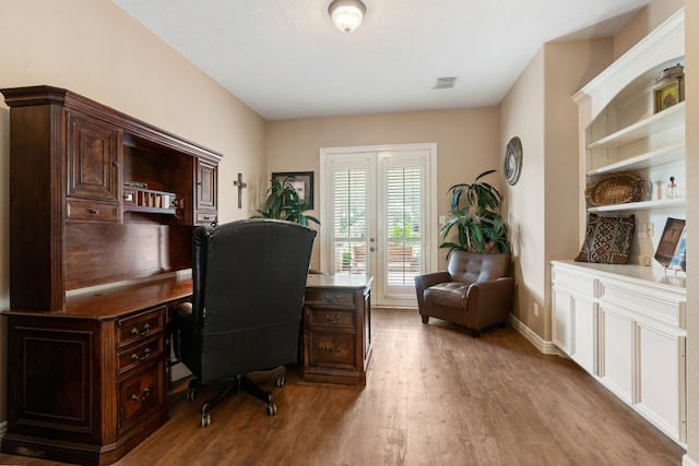 office space featuring hardwood / wood-style floors