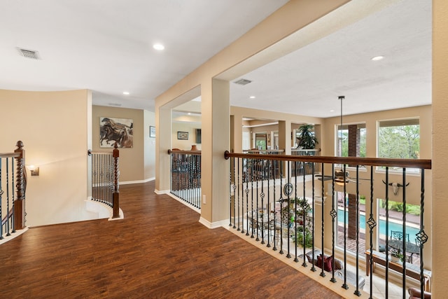 hall featuring dark wood-type flooring