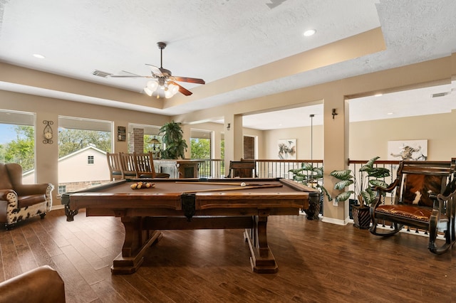 game room with dark wood-type flooring, ceiling fan, billiards, and a textured ceiling