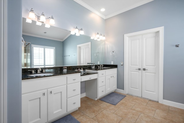 bathroom featuring vanity, crown molding, and tile patterned floors