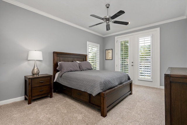 carpeted bedroom featuring ornamental molding, access to exterior, and ceiling fan