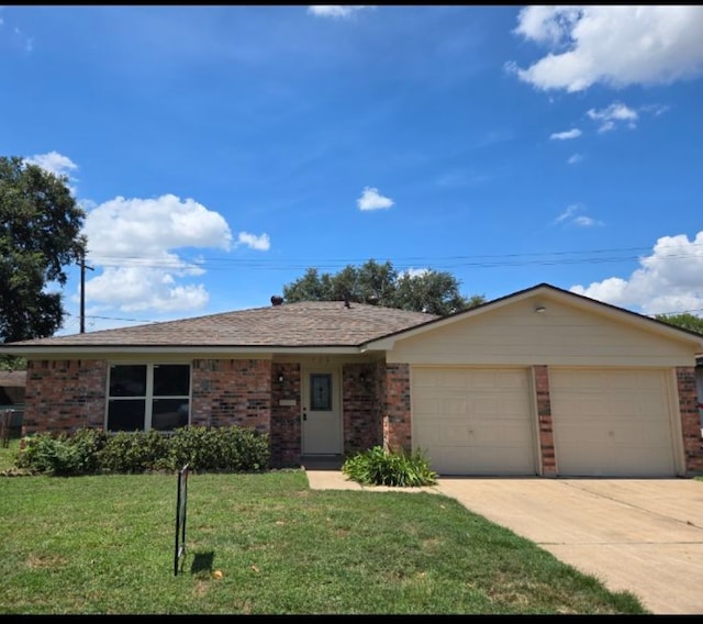 ranch-style home with a front lawn and a garage