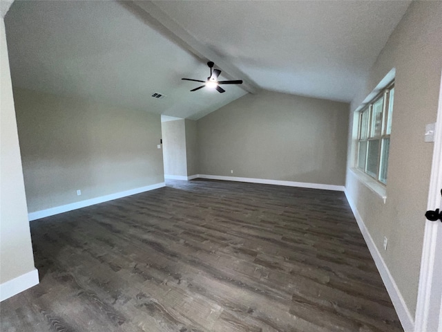 unfurnished living room featuring dark wood-type flooring, lofted ceiling, and ceiling fan