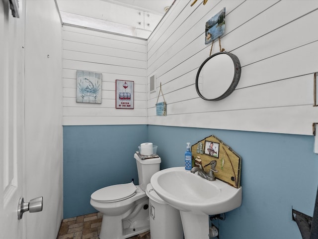 bathroom with sink and toilet