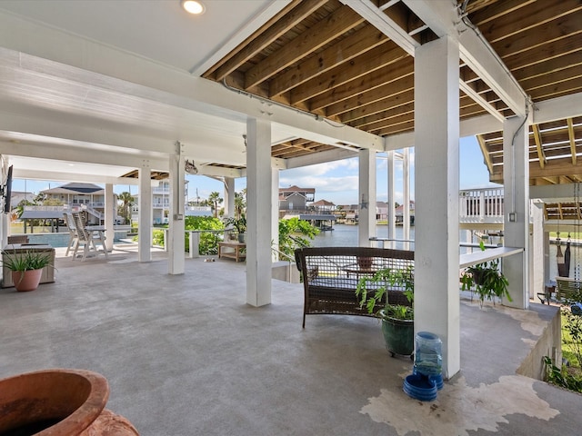 view of patio featuring a water view