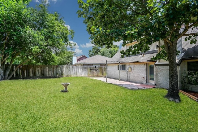 view of yard with a patio area