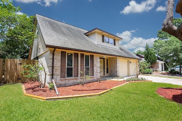 view of front facade with a front lawn and a garage