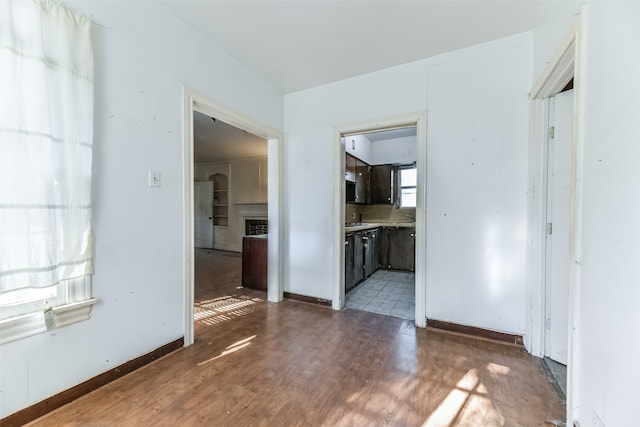 empty room featuring dark hardwood / wood-style flooring