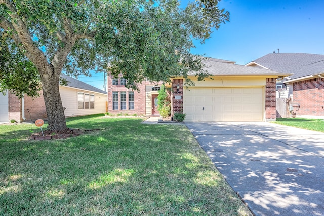 view of front facade with a front lawn and a garage