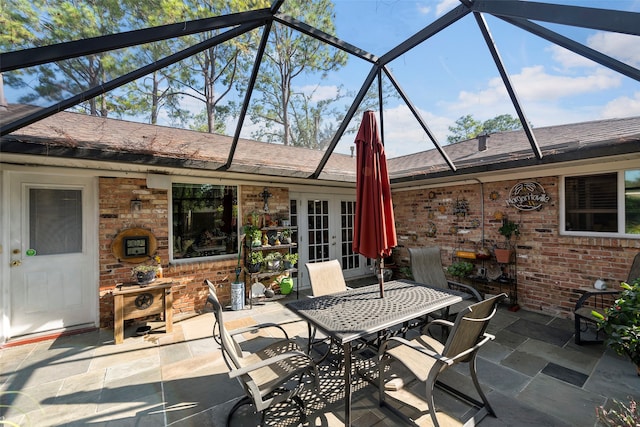 view of patio / terrace with a lanai and french doors