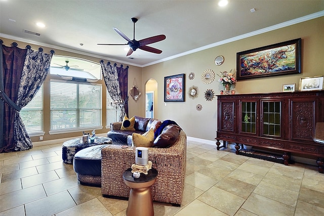 tiled living room featuring crown molding and ceiling fan