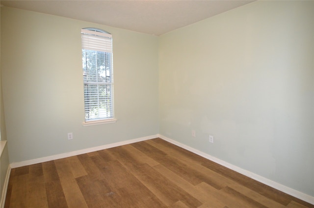 empty room featuring hardwood / wood-style floors