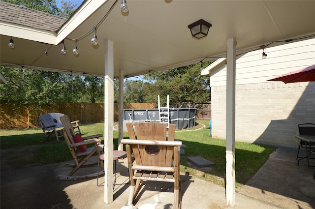 view of patio / terrace featuring a fenced in pool