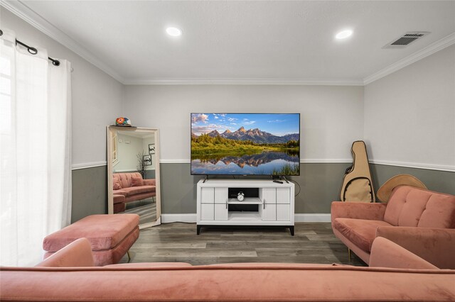 living room with crown molding and dark hardwood / wood-style floors