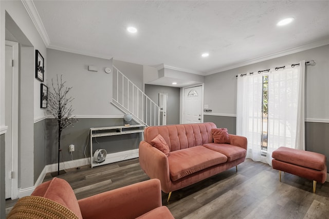 living room featuring crown molding and dark hardwood / wood-style flooring