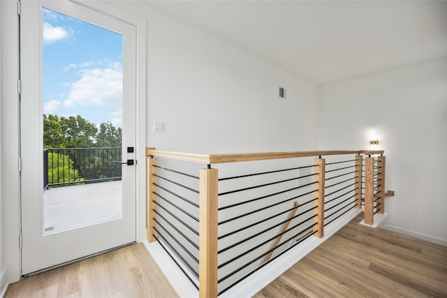 interior space featuring plenty of natural light and light hardwood / wood-style flooring