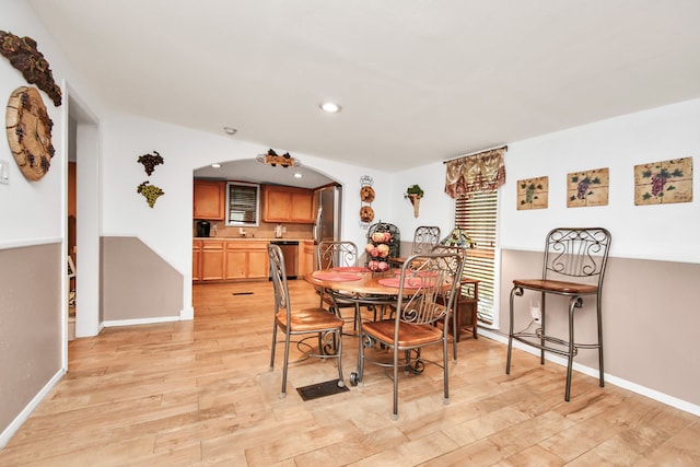 dining room featuring light wood-type flooring