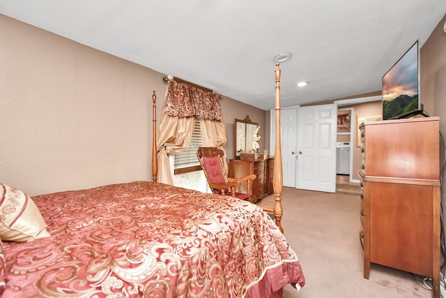 bedroom featuring light carpet