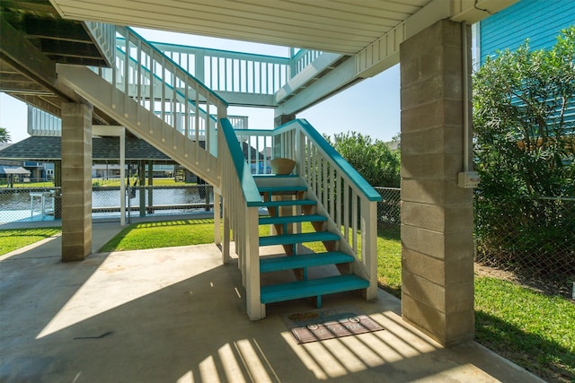 view of patio / terrace featuring a water view