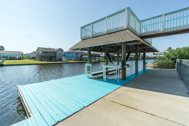 dock area featuring a water view