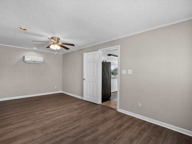 spare room with crown molding, a wall mounted AC, dark hardwood / wood-style flooring, and ceiling fan