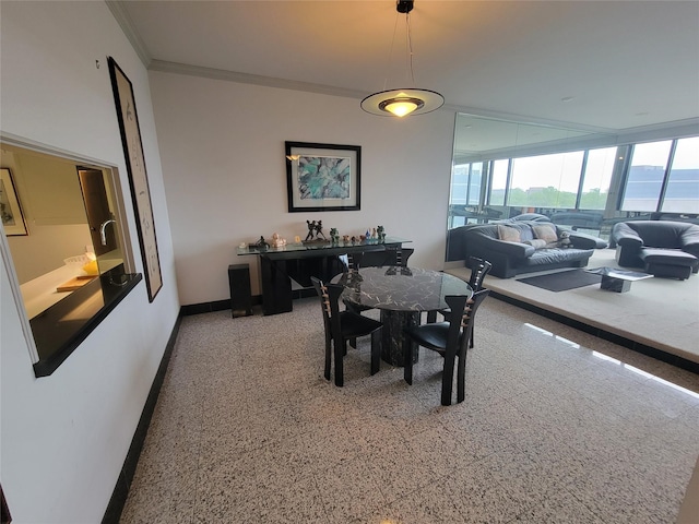 dining room with ornamental molding