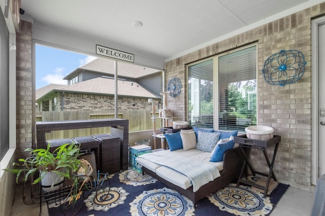 sunroom featuring lofted ceiling