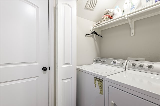 laundry area with washer and dryer